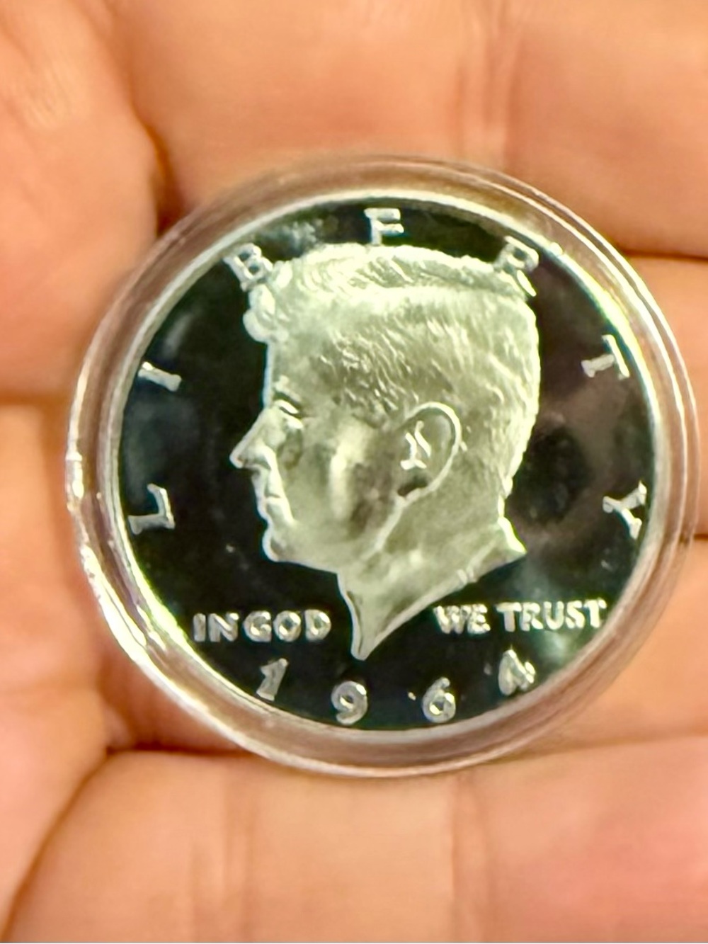 Silver-Tone 1964 Commemorative Coin in Protective Capsule